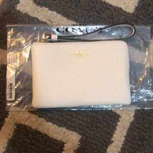 Brand new leather Coach wristlet